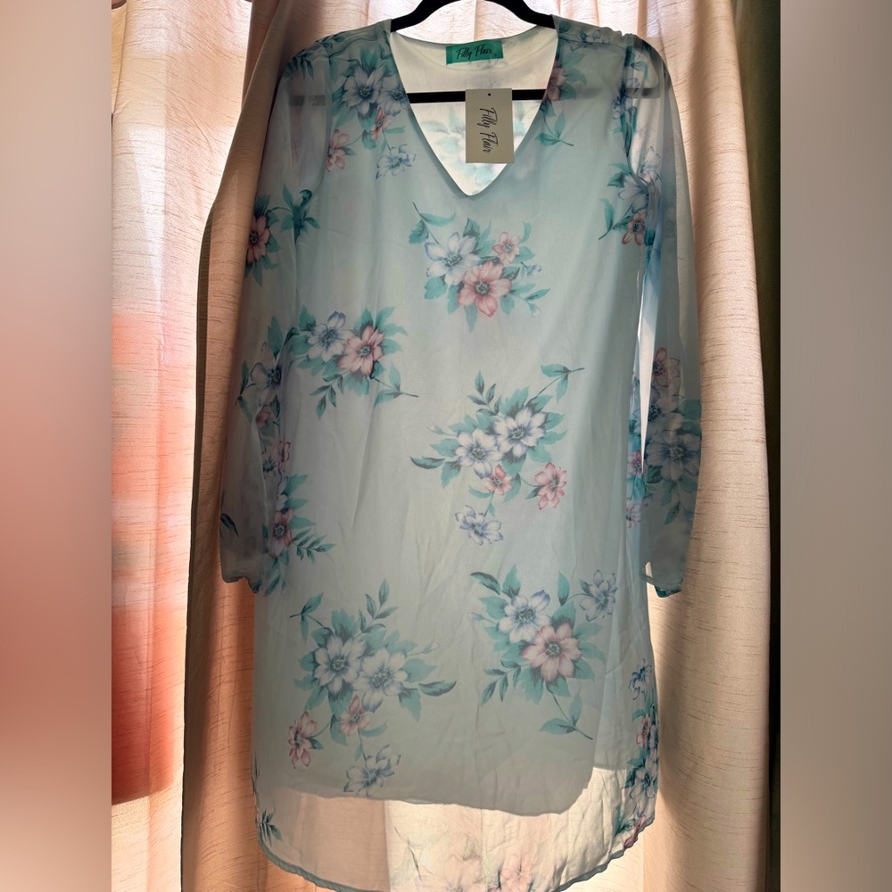 Pick 2 for $15 New with tags. Midi sheath dress. Baby blue floral. Size small.